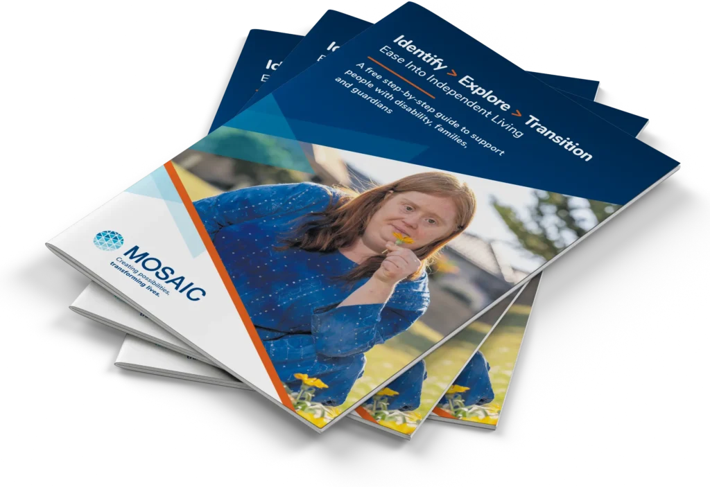 Image showing copies of Mosaic's free e-book on NDIS Supported Independent Living (SIL) in Perth.