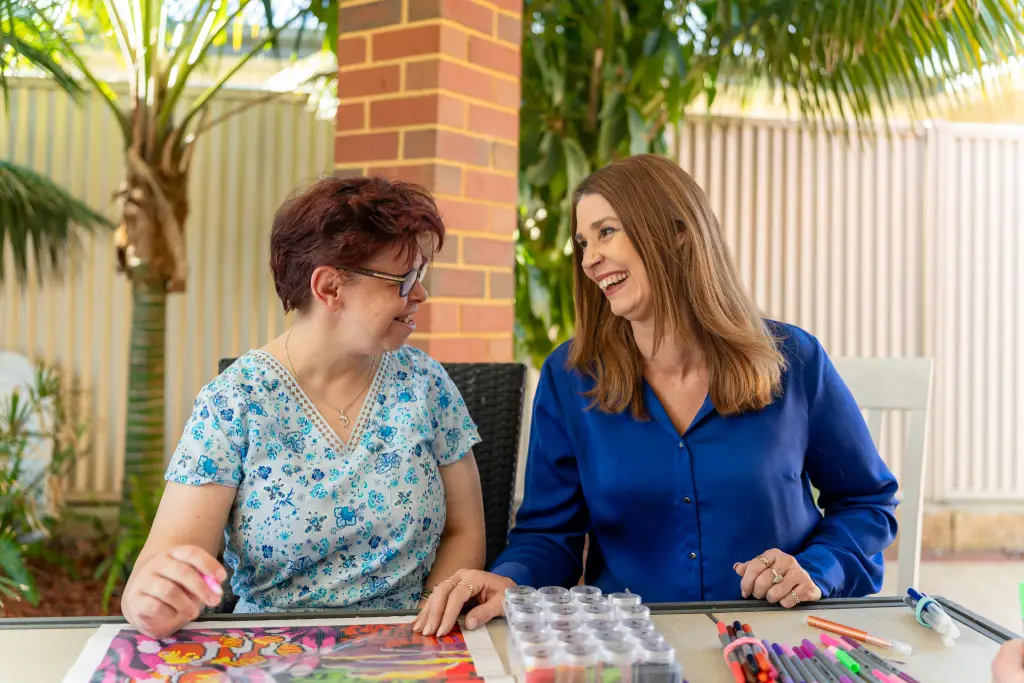 women doing art together